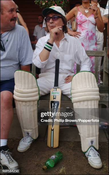 Bill Wyman of the Rolling Stones waits for his turn to bat during a Bunbury Cricket Club charity cricket match at Ripley, Surrey, 10th August 2003.