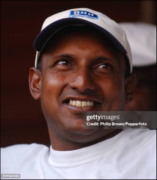 Aravinda de Silva of Sri Lanka takes part in a charity auction during a Bunbury Cricket Club cricket match at Ripley, Surrey, 10th August 2003.