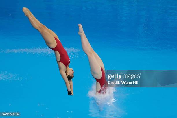 Wassen Elena and Kurjo Maria of Germany compete in the women's 10m Synchro Springboard final on FINA Diving World Cup 2018 at the Wuhan Sports Center...