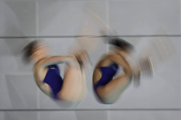 Cheng Eden and Toulson Lois of Great Britain compete in the women's 10m Synchro Springboard final on FINA Diving World Cup 2018 at the Wuhan Sports...