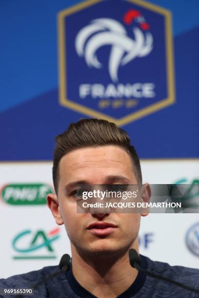 French forward Florian Thauvin speaks during a press conference at the French national football team's training centre in Clairefontaine-en-Yvelines,...