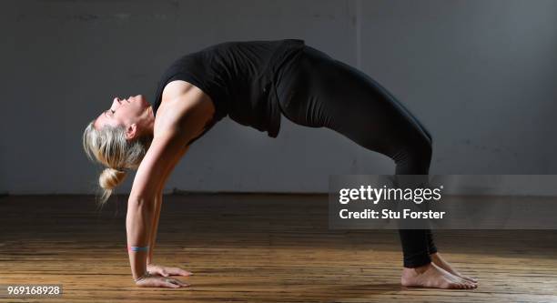 Yoga teacher and Wales and Ospreys Rugby Union player Alecs Donovan pictured demonstrating a Upward Bow/Wheel/Urdhva Dhanurasana during a Yoga...