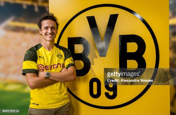 Thomas Delaney poses for a photo as he signs for Borussia Dortmund on June 7, 2018 in Dortmund, Germany.