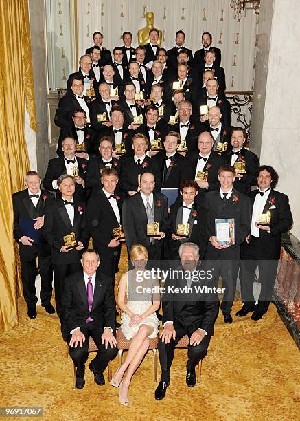 President Tom Sherak, actress Elizabeth Banks and Scientific and Technical Awards Committee chair Richard Edlund pose with this years winners at The...