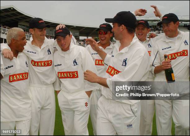 Ian Bell of Warwickshire is congratulated by teammates after being named man of the match after the Benson and Hedges Cup Final between Essex and...
