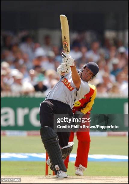 Neil Carter of Warwickshire hits out during the Twenty20 Cup Semi FInal between Leicestershire and Warwickshire at Trent Bridge, Nottingham, 19th...