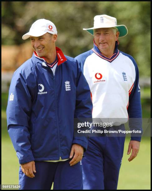England captain Nasser Hussain and team coach Duncan Fletcher share a laugh during a nets session at Finchley Cricket Club, London, 14th May 2002....