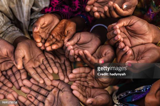 hands of poor - asking for help, africa - child labor stock pictures, royalty-free photos & images