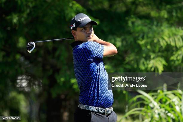 Fabian Gomez of Argentina plays his shot from the 12th tee during the first round of the FedEx St. Jude Classic at TPC Southwind on June 7, 2018 in...