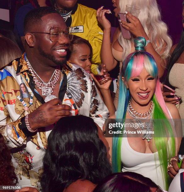 Pierre 'Pee' Thomas and Cardi B attend Pierre Thomas Birthday Celebration at Gold Room on June 7, 2018 in Atlanta, Georgia.