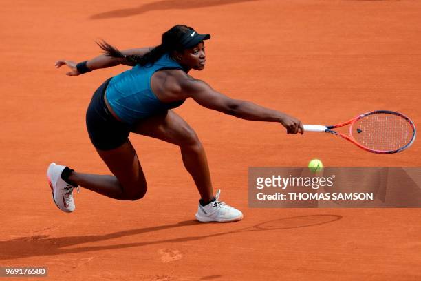 Sloane Stephens of the US plays a backhand return to Madison Keys of the US during their women's singles semi-final match on day twelve of The Roland...