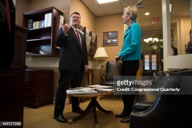 June 7: Sen. Elizabeth Warren, D-Mass., and Sen. Cory Gardner, R-Colo., prepare to hold a press conference in the Senate Radio and TV Gallery to...