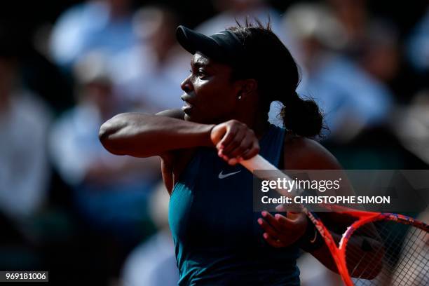 Sloane Stephens of the US returns the ball to Madison Keys the US during their women's singles semi-final match on day twelve of The Roland Garros...