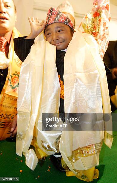Nepalese teenager Khagendra Thapa Magar gestures during a press conference in Kathmandu on February 21, 2010. Magar who weighs around 4.5 kilogrammes...