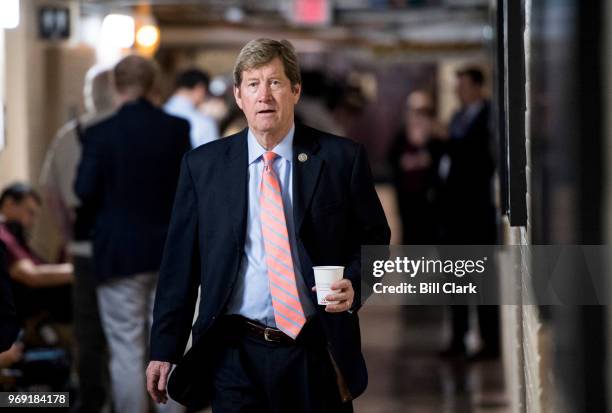 Rep. Jason Lewis, R-Minn., leaves the House Republicans' caucus meeting in the Capitol on immigration reforms on Thursday morning, June 7, 2018.