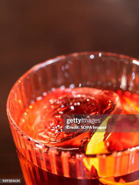 Cocktail with a slice of lemon at the bar. Restaurant Rooster Grill in downtown Kiev opened a new high-tech bar. This is the only bar in the capital...