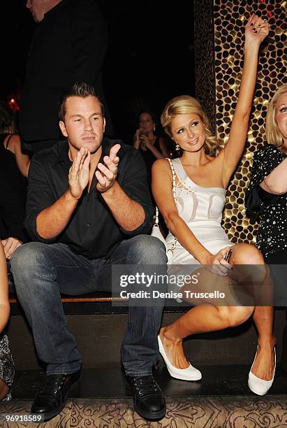 Doug Reinhardt and Paris Hilton attend TAO Nightclub at the Venetian on February 20, 2010 in Las Vegas, Nevada.