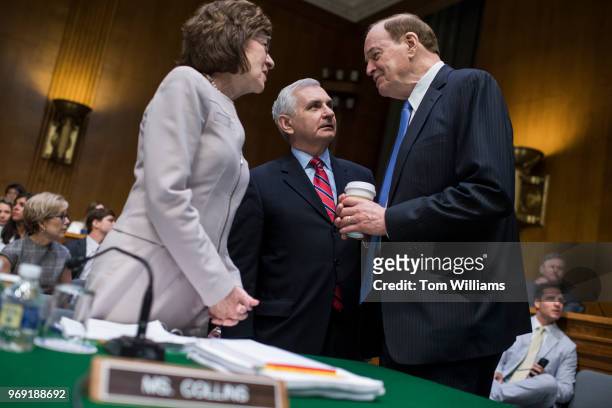 From left, Sens. Susan Collins, R-Maine, Jack Reed, D-R.I., and Chairman Richard Shelby, R-Ala., talk before a Senate Appropriations Committee markup...