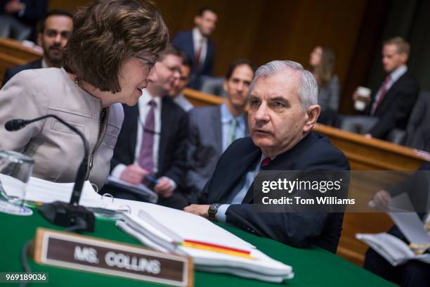 Sens. Jack Reed, D-R.I., and Susan Collins, R-Maine, talk before a Senate Appropriations Committee markup in Dirksen Building on June 7, 2018.