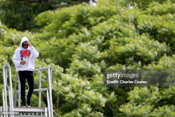 Lewis Hamilton of Great Britain and Mercedes GP arrives at the circuit during previews ahead of the Canadian Formula One Grand Prix at Circuit Gilles...