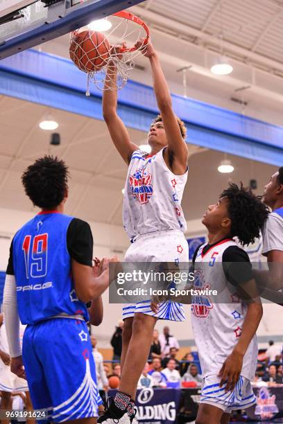 Xavier Foster from Oskaloosa Community High School dunks the ball during the Pangos All-American Camp on June 3, 2018 at Cerritos College in Norwalk,...