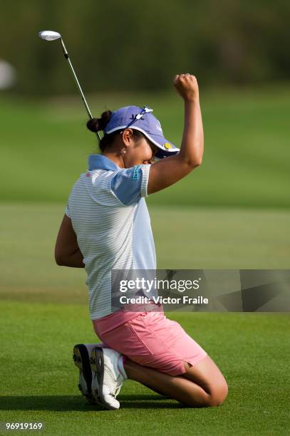 Ai Miyazato of Japan celebrates after sinking a chip shot on the 18th green during the final round of the Honda PTT LPGA Thailand at Siam Country...