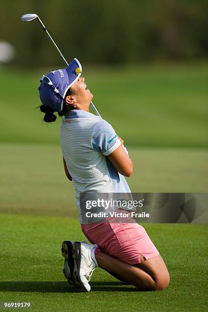 Ai Miyazato of Japan celebrates after sinking a chip shot on the 18th green during the final round of the Honda PTT LPGA Thailand at Siam Country...