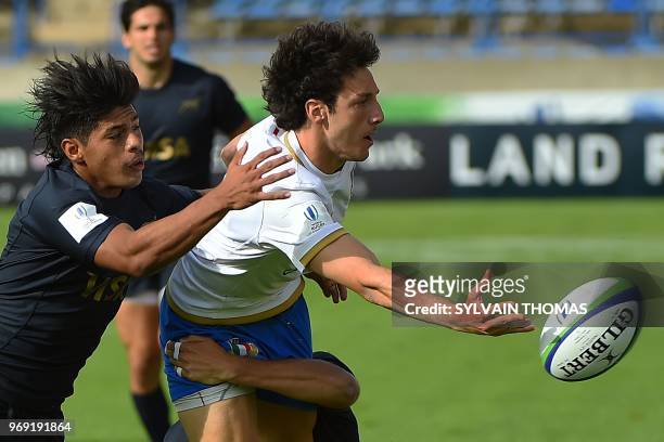 Italian's Giovanni D'Onofrio passes the ball during the Rugby Union World Cup U20 championship match Italy vs Argentina at the Mediterranean Stadium...