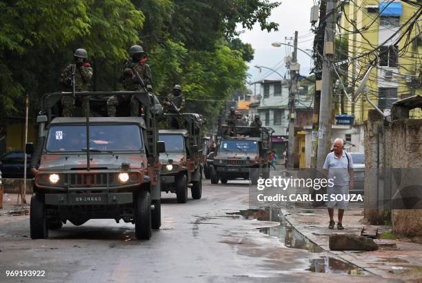 Security forces patrol during an operation at "Cidade de Deus" favela in Rio de Janeiro, Brazil on June 07, 2018.