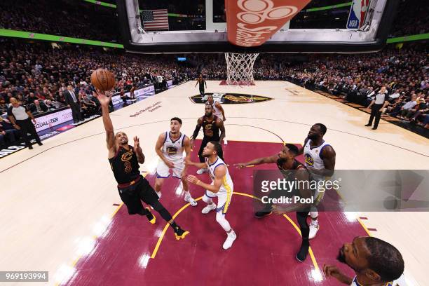 George Hill of the Cleveland Cavaliers shoots against Stephen Curry of the Golden State Warriors during Game Three of the 2018 NBA Finals at Quicken...