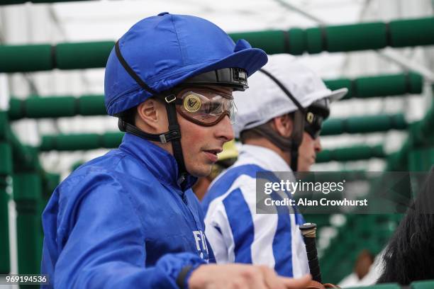 William Buick waits in the stalls at Sandown Park Racecourse on June 7, 2018 in Esher, United Kingdom.