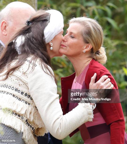 Lady Emma Joy Kitchener kisses Sophie, Countess of Wessex as they attend a service of dedication for a new memorial to commemorate the service of...
