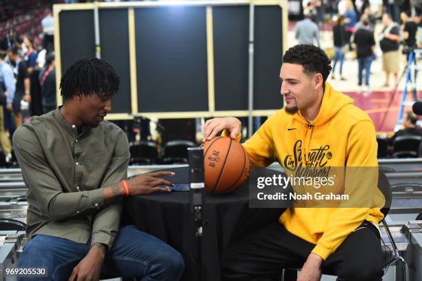 Rondae Hollis-Jefferson of the Brooklyn Nets interviews Klay Thompson of the Golden State Warriors during practice and media availability as part of...