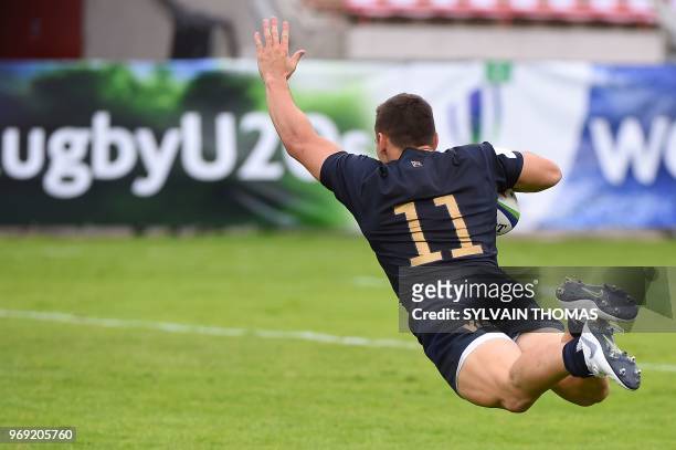 Argentina's Mateo Carreras scores a try during the Rugby Union World Cup U20 championship match Italy vs Argentina at the Mediterranean Stadium in...