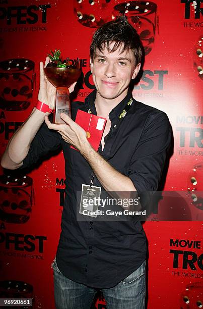Abe Forsythe, winner with 1st prize for "Shock" poses with his trophy during the Tropfest 2010 short film festival at The Domain on February 21, 2010...