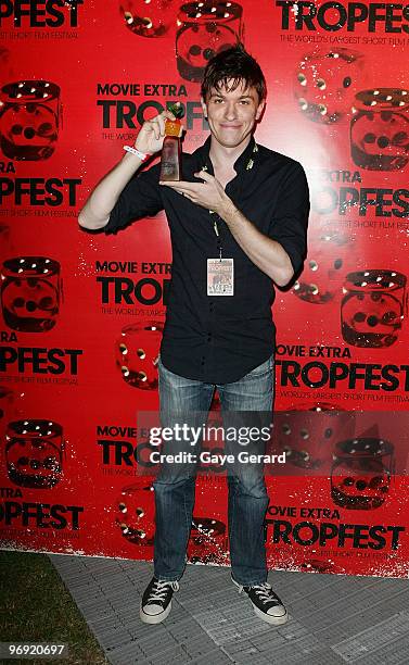 Abe Forsythe, winner with 1st prize for "Shock" poses with his trophy during the Tropfest 2010 short film festival at The Domain on February 21, 2010...