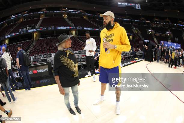 Jordan Bell poses while Superfan Jimmy Goldstein chats with JaVale McGee of the Golden State Warriors during practice and media availability as part...