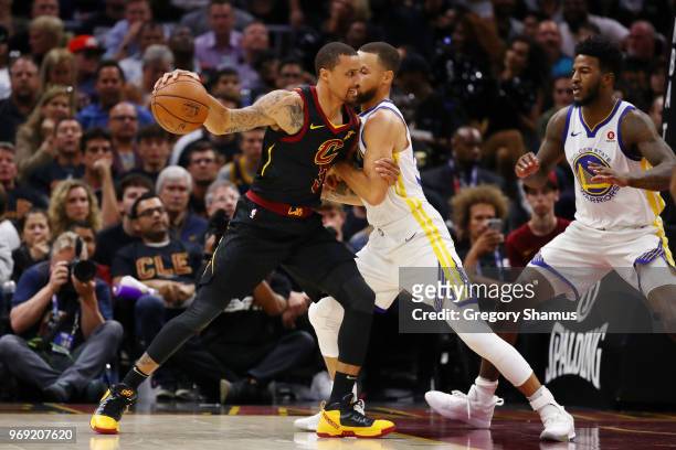 George Hill of the Cleveland Cavaliers drives against Stephen Curry of the Golden State Warriors during Game Three of the 2018 NBA Finals at Quicken...
