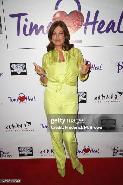 Model-actress Kelly LeBrock attends a press conference hosted by Van Nuys-based nonprofit Safe Passage announcing "Time2Heal," an expansion of its...