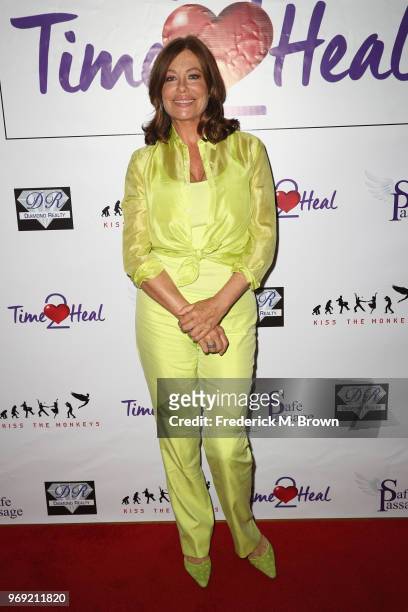 Model-actress Kelly LeBrock attends a press conference hosted by Van Nuys-based nonprofit Safe Passage announcing "Time2Heal," an expansion of its...