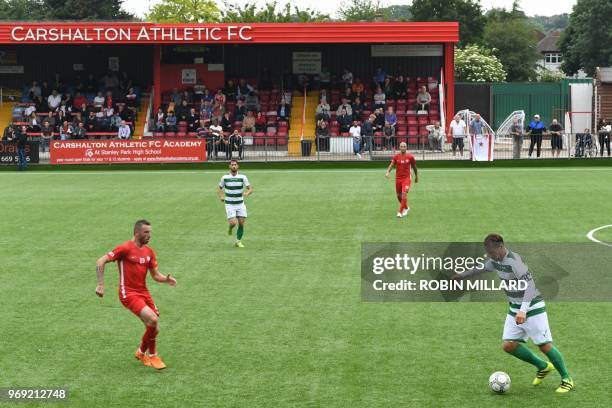 Northern Cyprus, in red play out a 3-2 victory over Padania in the Confederation of Independent Football Association 's 2018 World Football Cup...