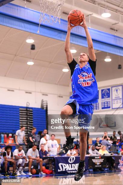 Samuel Williamson from	Rockwall High School goes up for a dunk during the Pangos All-American Camp on June 1, 2018 at Cerritos College in Norwalk, CA.