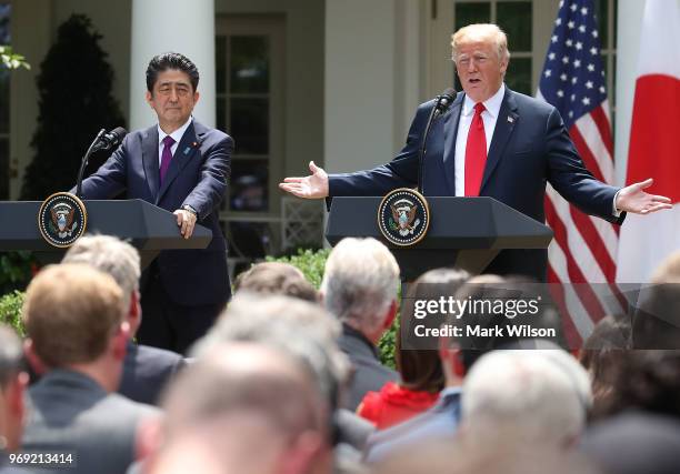 President Donald Trump and Japanese Prime Minister Shinzo Abe speak to the media during a news conference in the Rose Garden at the White House, on...