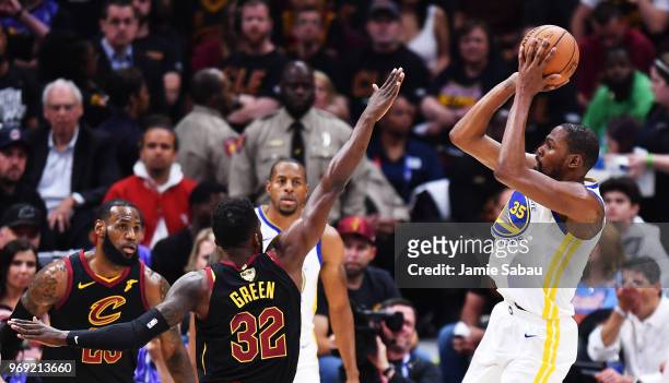 Kevin Durant of the Golden State Warriors shoots against Jeff Green of the Cleveland Cavaliers during Game Three of the 2018 NBA Finals at Quicken...