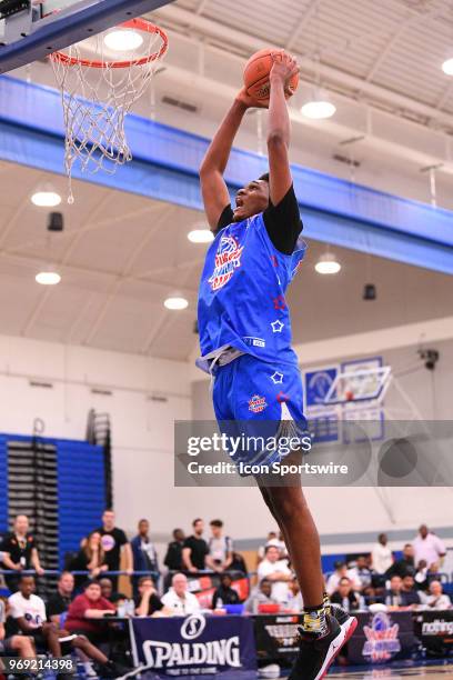 Antwan January from Santa Monica High School goes up for a dunk during the Pangos All-American Camp on June 3, 2018 at Cerritos College in Norwalk,...