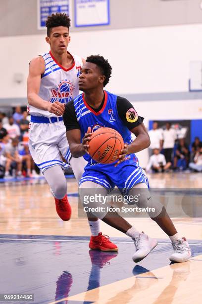Joe Toussaint from Cardinal Hayes High School drives to the basket during the Pangos All-American Camp on June 3, 2018 at Cerritos College in...