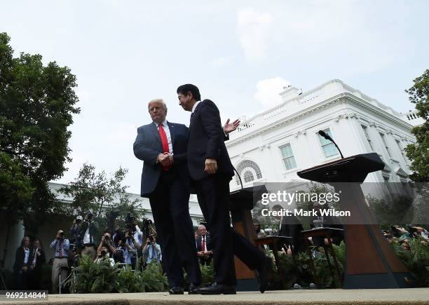 President Donald Trump and Japanese Prime Minister Shinzo Abe shake hands after a news conference in the Rose Garden at the White House, on June 7,...