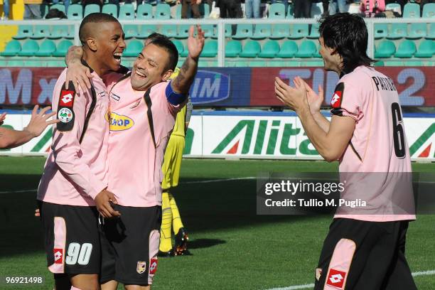 Abel Hernandez of Palermo and his team mates Fabrizio Miccoli and Javier Pastore celebrate the opening goal during the Serie A match between US Citta...