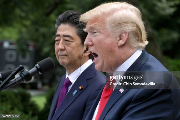 President Donald Trump and Japanese Prime Minister Shinzo Abe hold a joint news conference in the Rose Garden at the White House June 7, 2018 in...