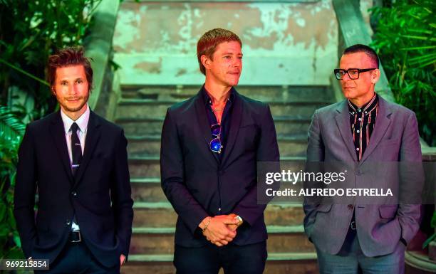 Rock band Interpol members lead guitar player and backing vocals Daniel Kessler, lead singer and bass guitar player, Paul Banks and drummer Sam...